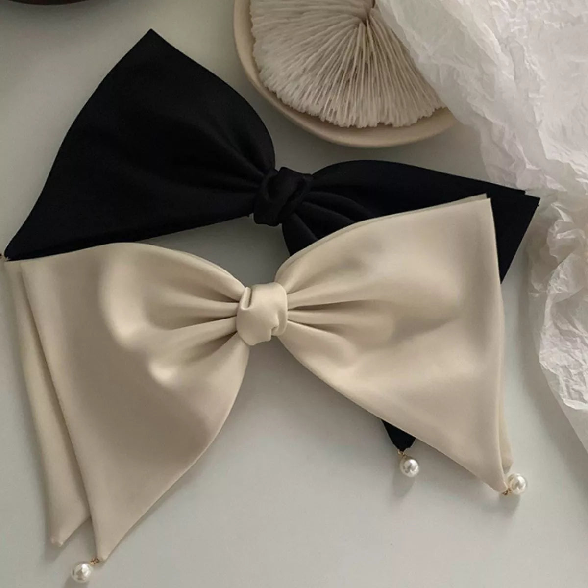 Elegant satin pearl bow hair clip in beige